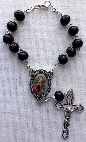 Car rosary black carved - car,